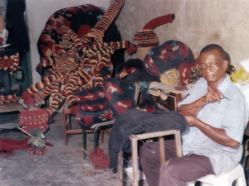 Stitching Ekpe mask