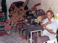 Stitching Ekpe mask